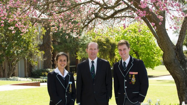 Acting principal Roger Smith with 2015 college captains Tansy Pereira and Sam Goodear.