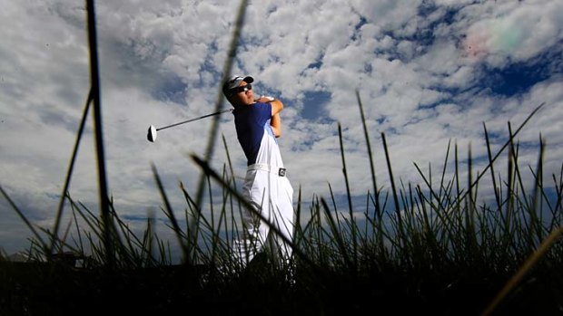 Drive time: Andy Zhang, 14, plays a shot at The Lakes golf course on Friday.