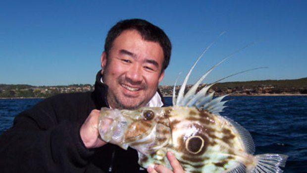 Chef Tetsuya Wakuda displays his catch.