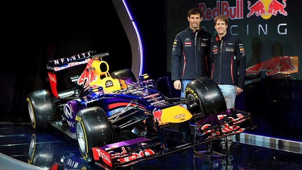 Ready ... Sebastian Vettel, right, with teammate Mark Webber at the launch of the new Red Bull car at Milton Keynes.
