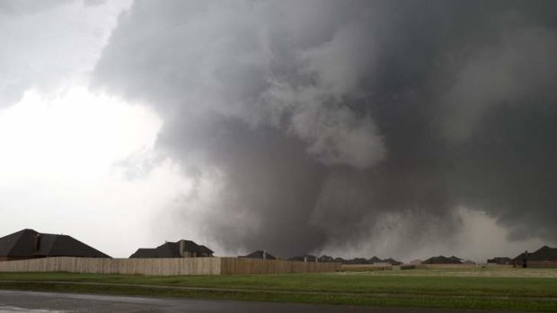 A huge tornado approaches the town of Moore, Oklahoma, near Oklahoma City, May 20, 2013.
