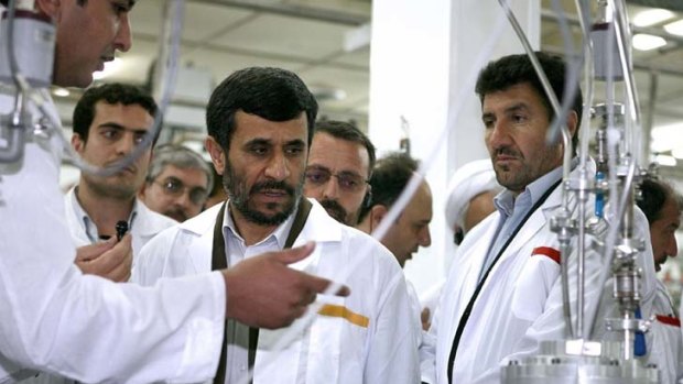 Iranian President Mahmoud Ahmadinejad visiting the Natanz uranium enrichment facility.