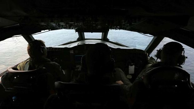 Pilots aboard a Royal New Zealand Air Force P-3K2 Orion aircraft searching the southern Indian Ocean for the plane on Saturday.