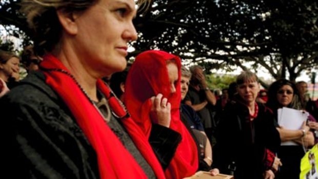 Emotional...rally organiser Barbara Biggs with supporters in Sydney yesterday.