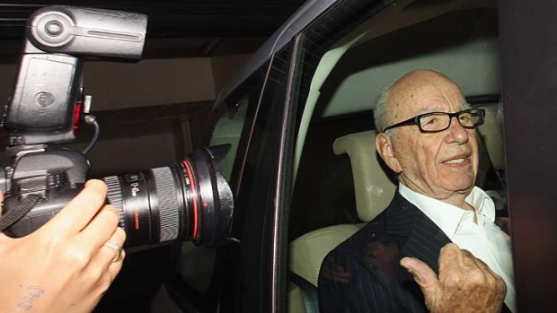 Rupert Murdoch ... strongly denies he'll be selling his other papers.