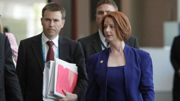 Prime Minister Julia Gillard has announced the appointment of her former senior international adviser Richard Maude (left) as head of the Office of National Assessment.