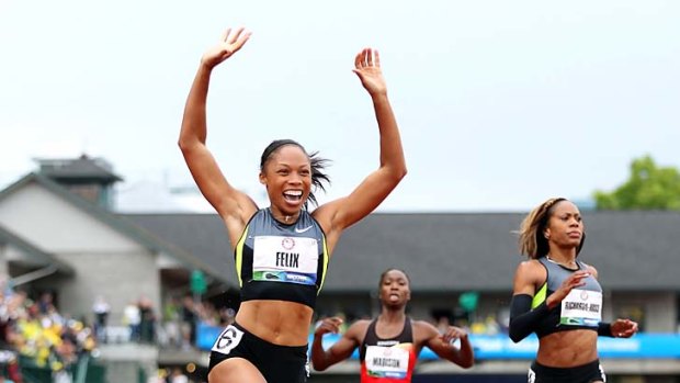 Clear winner: Allyson Felix strides to success in  the 200 metres at the US Olympic trials.