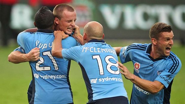 Ecstasy … Rhyan Grant’s late goal pulls Sydney FC off the bottom of the ladder.