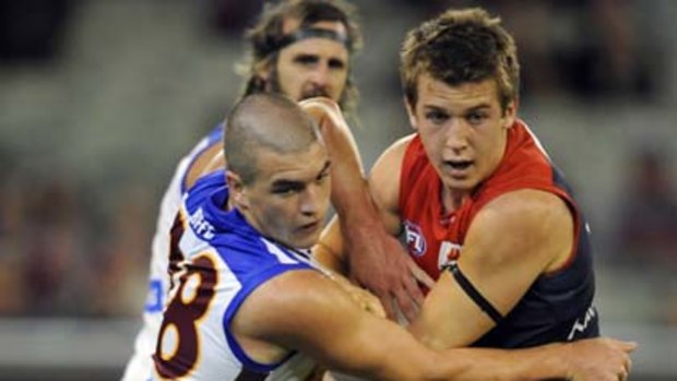 Tom Rockliff (left) credits his rise to his summer regime.