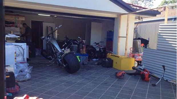 Police raid a Gold Coast home on Tuesday as part of their investigation into an alleged drug syndicate.
