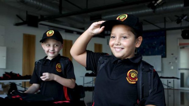 First in &#8230; Breanna Riley, left, and Brody Pyle try on their uniforms before starting school at the new Redfern Jarjum College this week.
