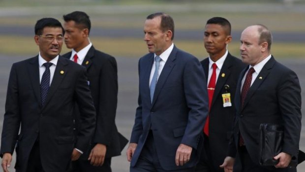Welcome: The Prime Minister was greeted at Halim Perdanakusuma airport in Jakarta.