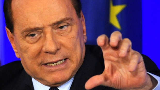 Flexing his political muscle ... Silvio Berlusconi.