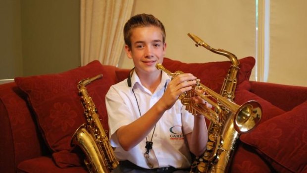 Lachlan Glover plays both trumpet and saxophone. 