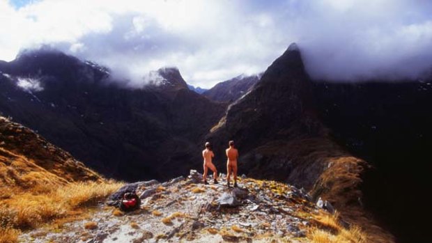 Naked beauty ... hikers admire the view at Mackinnon Pass in New Zealand.