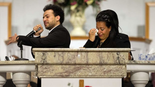 'True friend' Chris Kelly remembered ... Chris Smith, left, of the rap duo Kris Kross, speaks at the Atlanta funeral service with his sister, Jennifer Smith, right.