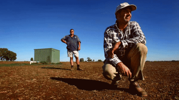 Farmers David (front) and Murray Glass installed a $80,000 on their property at the urging of the state government in 2006. They say the government's new irrigation scheme is likely to send their bore dry. Photo: Craig Sillitoe