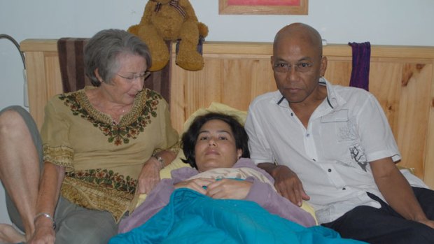Theda with her mother Carol Adams and father Aung Myint.