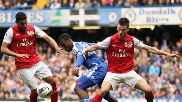 Daniel Sturridge of Chelsea battles for the ball against Arsenal.