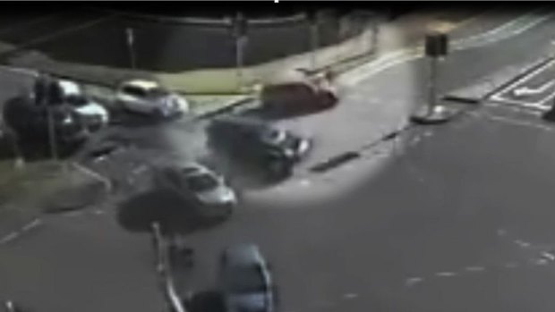 CCTV captures the moment a boy was struck by a car at an intersection at Benowa, on the Gold Coast.
