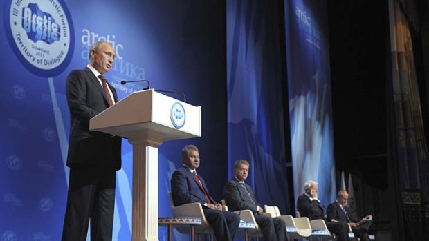 "It's completely obvious these people violated the norms of international law": Russia's President Vladimir Putin delivers a speech at the International Arctic forum.