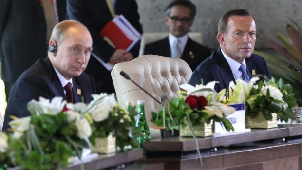 Headed for a "shirt-front": President Vladimir Putin and Prime Minister Tony Abbott.