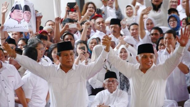 Indonesian presidential candidate Prabowo Subianto, left, and running mate Hatta Rajasa.