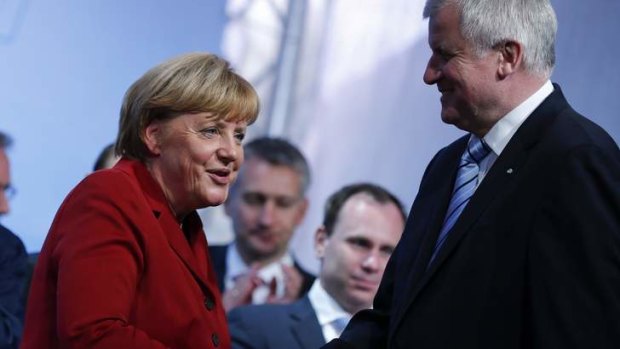 Unifier: German Chancellor Angela Merkel on the campaign trail with Bavarian state Premier Horst Seehofer.