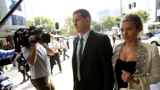 Outta here . . . Greg Bird and Katie Milligan  leave court yesterday after his appeal victory. Next stop could be the Gold Coast Titans.