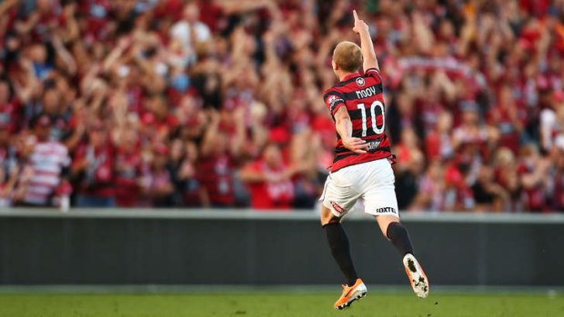 Time to celebrate: Aaron Mooy of the Wanderers.