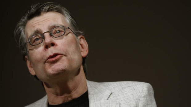 Author Stephen King speaks at a news conference.