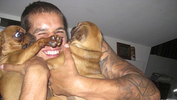 Lance 'Buddy' Franklin with the pugalier puppies.