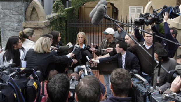House detention ... Glenn Wheatley’s wife, Gaynor, speaks to the media outside their South Yarra residence.