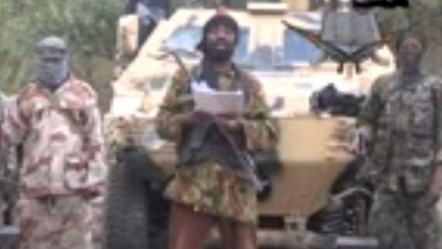 A shot from a video made byl Boko Haram, in which the group's leader Abubakar Shekau  vowed to sell the kidnapped schoolgirls.