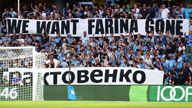 Sign of the times: Sydney FC fans hold up a banner in protest of team management during the match between Sydney FC and Adelaide United.