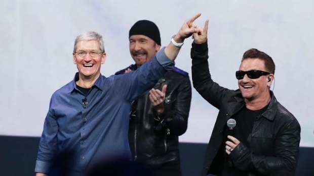 Unwanted: Apple CEO Tim Cook and U2 singer Bono before the controversial album launch.