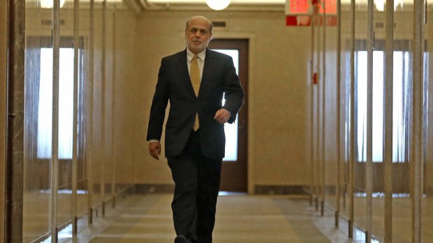 Ben Bernanke walks out of his office for the last time as Federal Reserve Chairman.