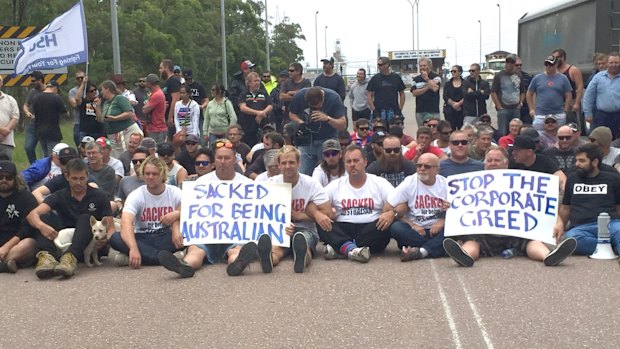 The five seafarers after they were were removed from the CSL Melbourne by police.