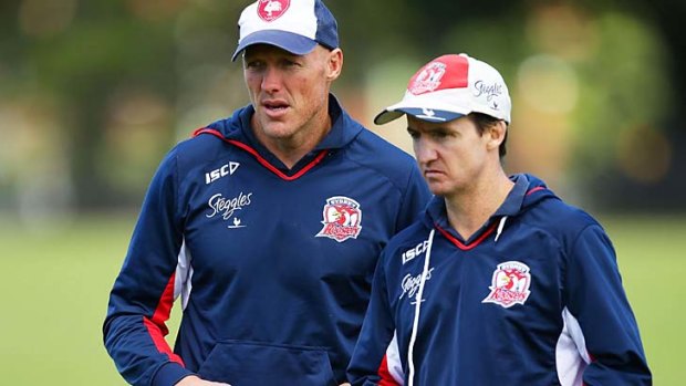Dodged a bullet: Roosters assistant coach Jason Taylor (R).