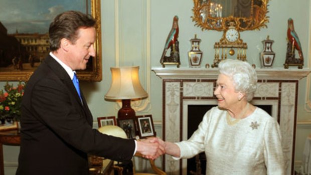 The Queen congratulates Mr Cameron after inviting him to form government.