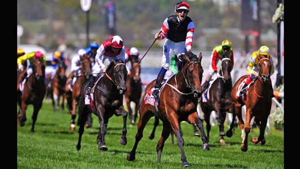 Hugh's day: Hugh Bowman storms to victory on Planski in the Victoria Derby.