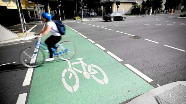 The state government will review road rules on the overtaking of cyclists.