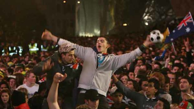 Crowds gather in Federation Square to watch the 2006 World Cup match between Australia and Brazil.