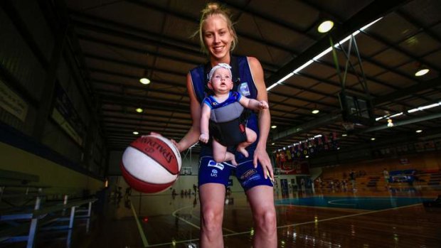 Mum's the word: Canberra basketballer Abby Bishop with her five-month-old niece Zala whom she has been looking after for her sister since last August.
