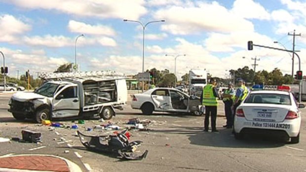 Police survey the wreckage after a horror crash in Wangara, which killed a five-year-old boy.