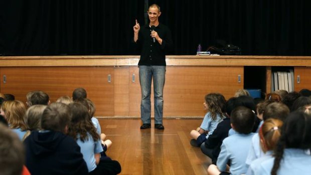 Author Andy Griffiths explains the process of coming up with a story to students at the Ainslie School.