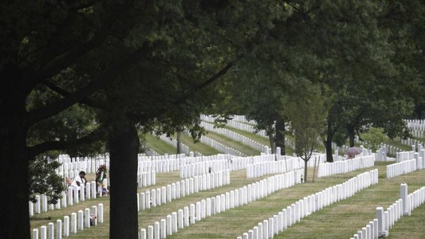 The graves of America's fallen stretch out at Arlington National Cemetery.