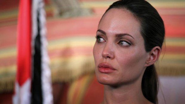 "Horrific" ... Angelina Jolie speaks to the media during a visit to the Zaatari camp in Mafraq, Jordan.