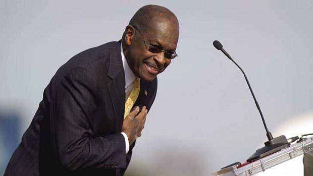 Bowing out ... Republican presidential candidate Herman Cain announces the end of his campaign.