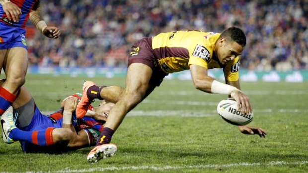 Untouchable: Justin Hodges goes in to score.